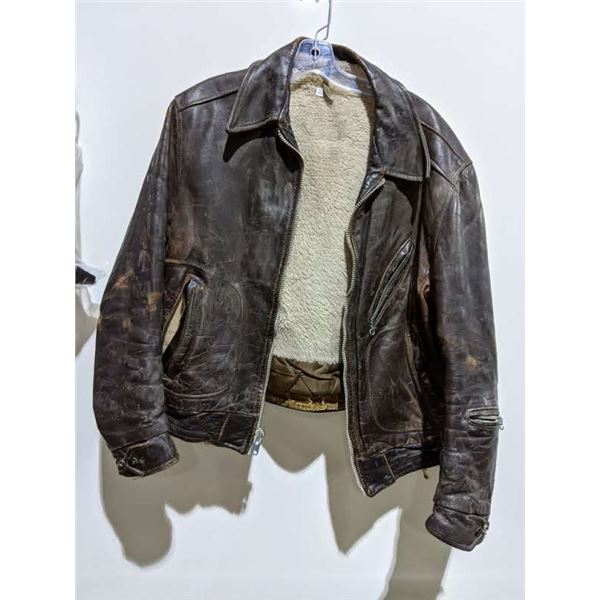 Leather coat with bag of assorted accessory from Man in the High Castle