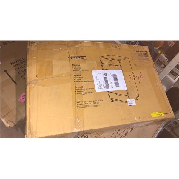 A pallet of assorted boxed furniture and misc items