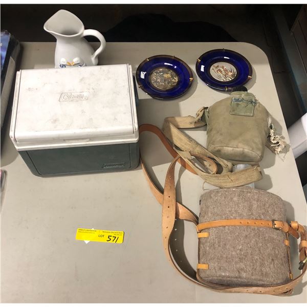 2 Military water canteens, 1 small ice box, 2 small decortative plates and 1 ceramic jug