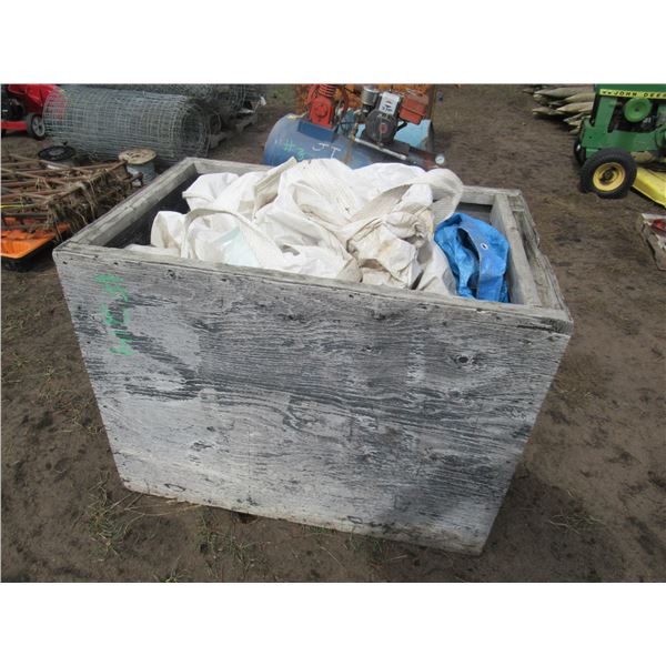 CRATE FULL OF FERTILIZER BAGS