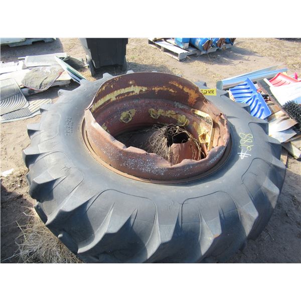 TRACTOR TIRE ON POOR RIM (20.8-38)