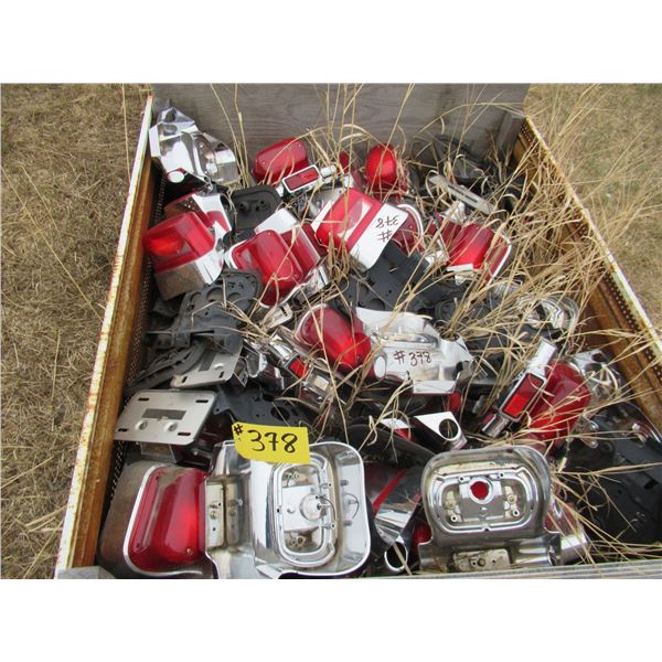 CRATE FULL OF MOTORBIKE TAIL LIGHTS