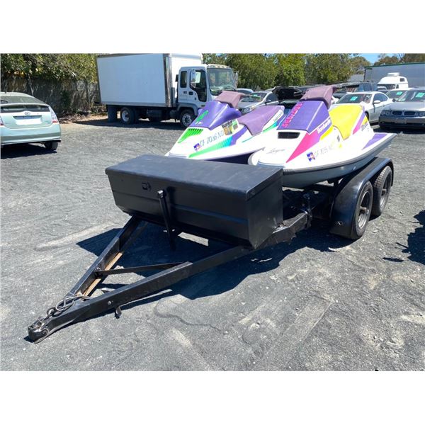 TWO JETSKI AND A TRAILER