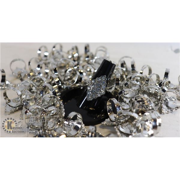 BAG OF DIAMOND SHAPED RINGS FASHION RINGS WITH WHITE STONES, MORE THAN 6 DOZ