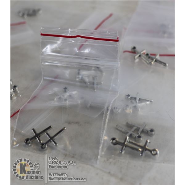 BAG OF 18 PAIRS OF SMALL SILVER CHARMS CROSSES
