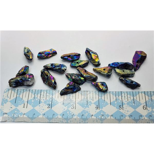 16)  LOT OF 18 RAINBOW HEMATITE SPIKES WITH DRILLED HOLES,  WEIGHS 43.1 GRAMS.  COLLECTIBLES