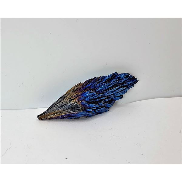 1)  RAINBOW TITANIUM QUARTZ MINERAL SPECIMEN MEASURES 2.5" X 1.75", 17 GRAMS.  COLLECTIBLES