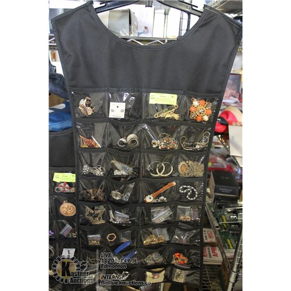 LARGE HANGING JEWELRY ORGANIZER WITH ESTATE JEWELR SOME STERLING SILVER, WATCHES (TIMEX AND MORE), E