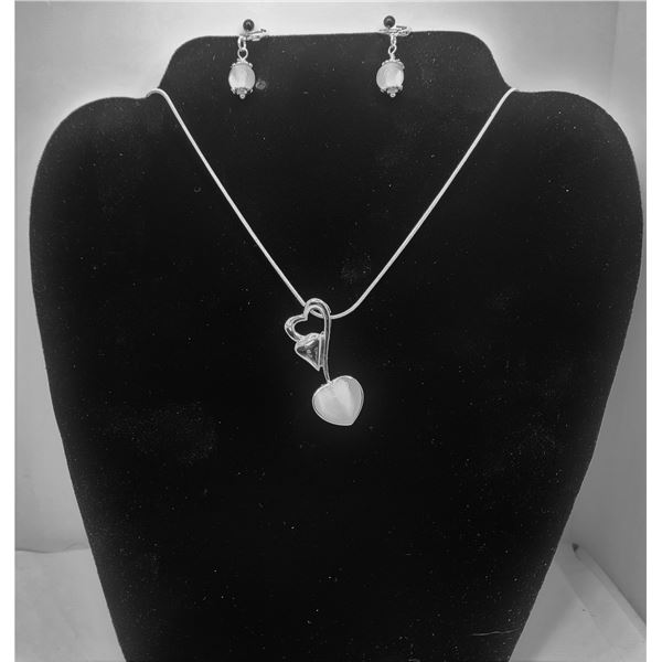26)  HEART SHAPED WHITE CAT'S EYE SLIDE STYLE PENDANT SET IN TIBETAN SILVER ON 18" SNAKE CHAIN WITH 