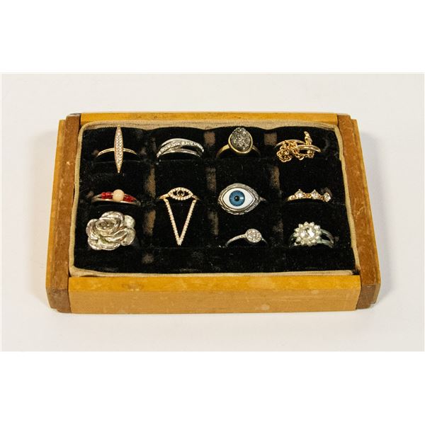 11 RINGS IN WOOD RING DISPLAY