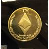 Image 2 : MINT GOLD PLATED ETHEREUM COIN IN PROTECTIVE CASE.