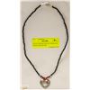 Image 1 : HEART PENDANT ON 18" NECKLACE. STRUNG ON SILVER
