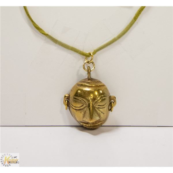 2" BRASS EGYPTIAN PENDANT ON 18" LEATHER ROPE