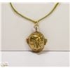 Image 1 : 2" BRASS EGYPTIAN PENDANT ON 18" LEATHER ROPE
