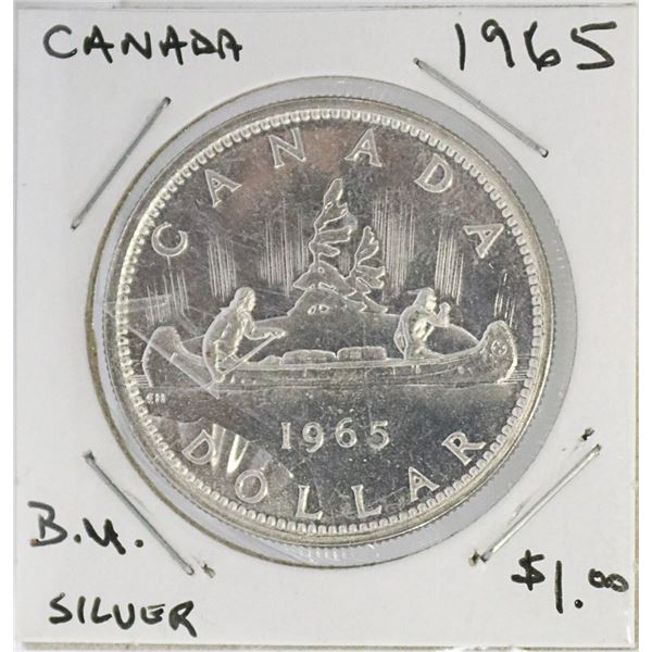 1965 CANADIAN SILVER DOLLAR COIN.