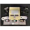 Image 1 : SUPER NINTENDO ENTERTAINMENT SYSTEM W/3 GAMES AND ACCESSORIES