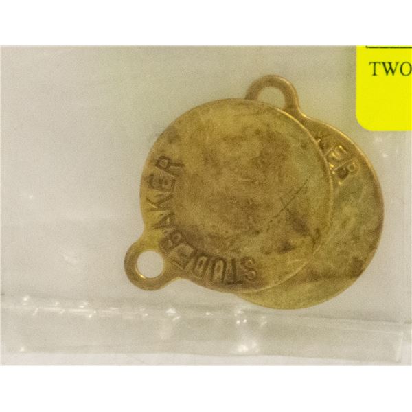 TWO STUDEBAKER ROOL TAGS