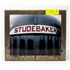 Image 1 : STUDEBAKER 'M' GRILL ON TIN BOX
