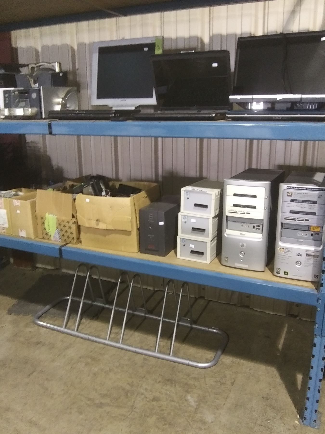 SHELF LOT OF COMPUTERS , PARTS, AND RACKS