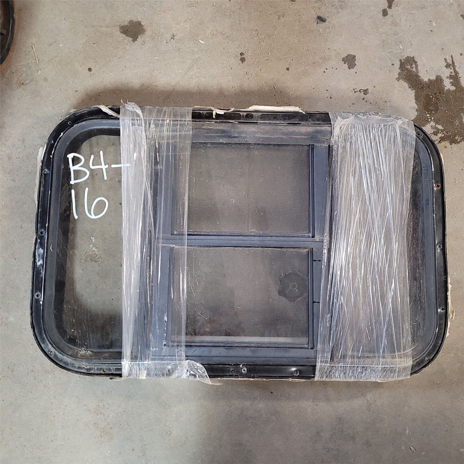 Used Slanted Black Radius Opening Window : 48 X 15 X  2 1/2