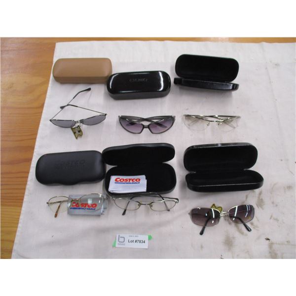 Six Pairs of Sunglasses in Cases