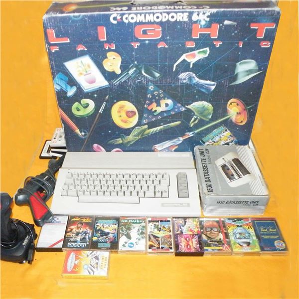 VINTAGE COMMODORE C64 DATASSETTE UNIT CASSETTE PLAYER BOXED WITH GAMES. REF: COMMODORE.