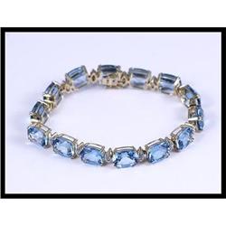 14K Yellow Gold Blue Topaz and Diamond Link #1844564