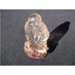 Antique rock crystal carving featuring Buddha #1844689