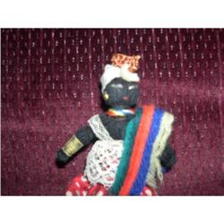 Black minature yarn doll #1819959