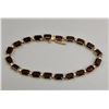 Image 1 : 14k Gold and Garnet Tennis Bracelet