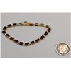 Image 8 : 14k Gold and Garnet Tennis Bracelet