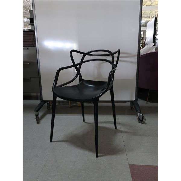 LOT: 4 BLACK PLASTIC CHAIRS