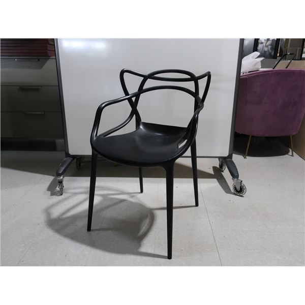 LOT: 4 BLACK PLASTIC CHAIRS