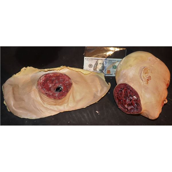 SEVERED FEMALE HEAD WITH MATCHING STUMP