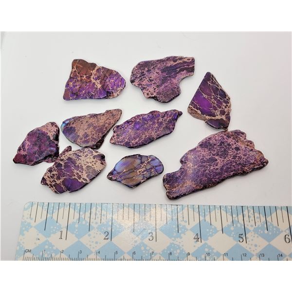 20)  LOT OF 9 PURPLE JASPER SLICES, 83.7 GRAMS IN WEIGHT.