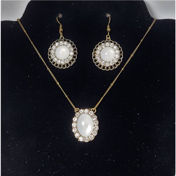 15)  BRONZE TONE WITH WHITE OPALINE AND CLEAR CRYSTAL PENDANT ON 20" CHAIN AND MATCHING DROP EARRING