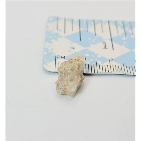 19)  NATURAL   3.5 CT ETHIOPEAN ROUGH OPAL GEMSTONE.