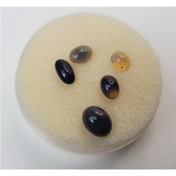 9)  LOT OF 5 NATURAL BLACK OPALS CARET TOTAL WEIGHT 2.995,  READY FOR SETTING.
