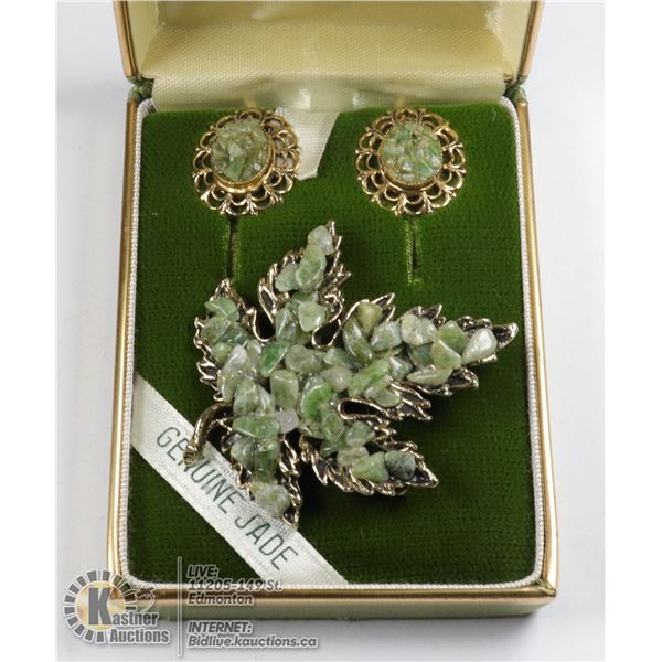 A GOLD MAPLE LEAF WITH CRUSHED JADE AND ONE SET OF CRUSHED