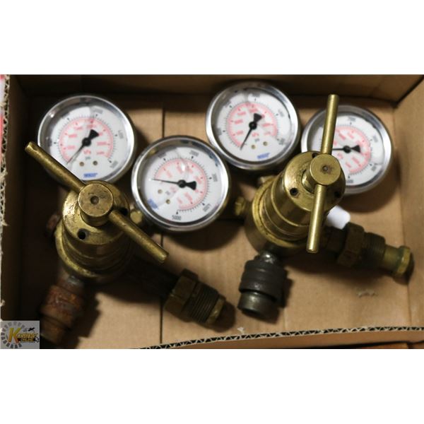 TWO PRESSURE REGULATORS W/ 5000 PSI GAUGES.