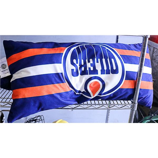 A PAIR OF EDMONTON OILERS BODY PILLOW 14" X 30"