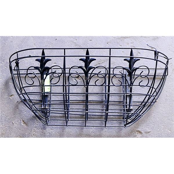 A PAIR OF METAL WALL PLANTER HOLDER