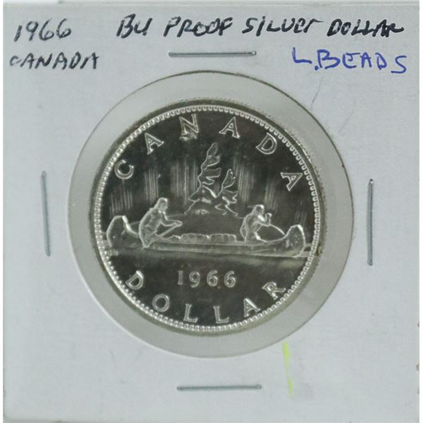 1966 CANADIAN SILVER DOLLAR COIN.