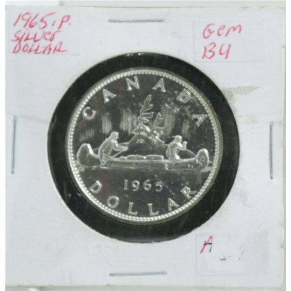1965 CANADIAN SILVER DOLLAR COIN.