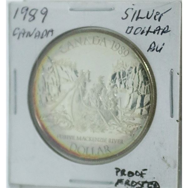 1989 CANADIAN SILVER DOLLAR COIN.