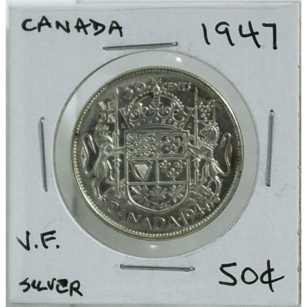 1947 CANADIAN FIFTY CENT SILVER COIN.