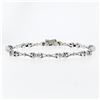 Image 1 : 14K White Gold 7" .33 ctw Bezel Set Diamond & Figure "X" Link Tennis Bracelet