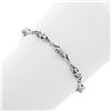 Image 3 : 14K White Gold 7" .33 ctw Bezel Set Diamond & Figure "X" Link Tennis Bracelet