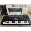 Image 1 : OPTIMUS MUSICAL KEYBOARD WITH BOX WORKS GOOD