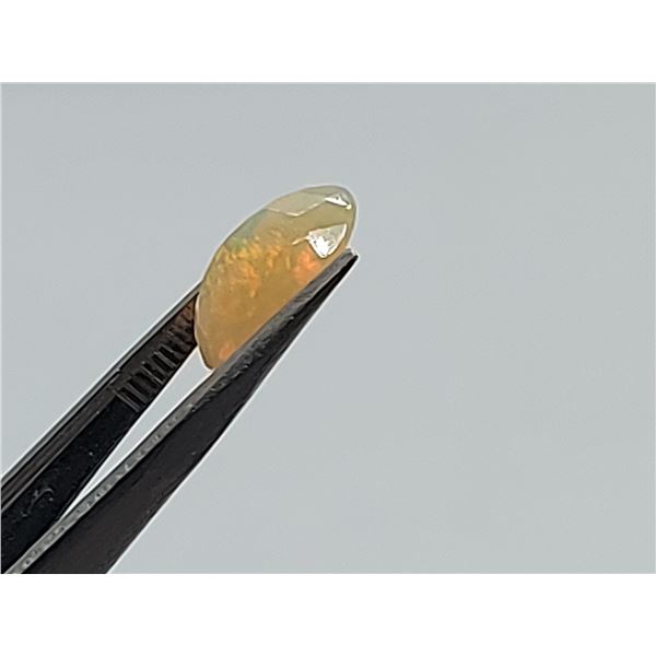 1.54 ct. FACETED WELO OPAL